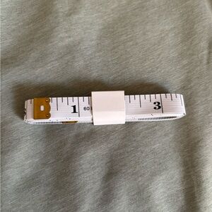 White Flexible Measuring Tape for Accurate Wearable Sizing